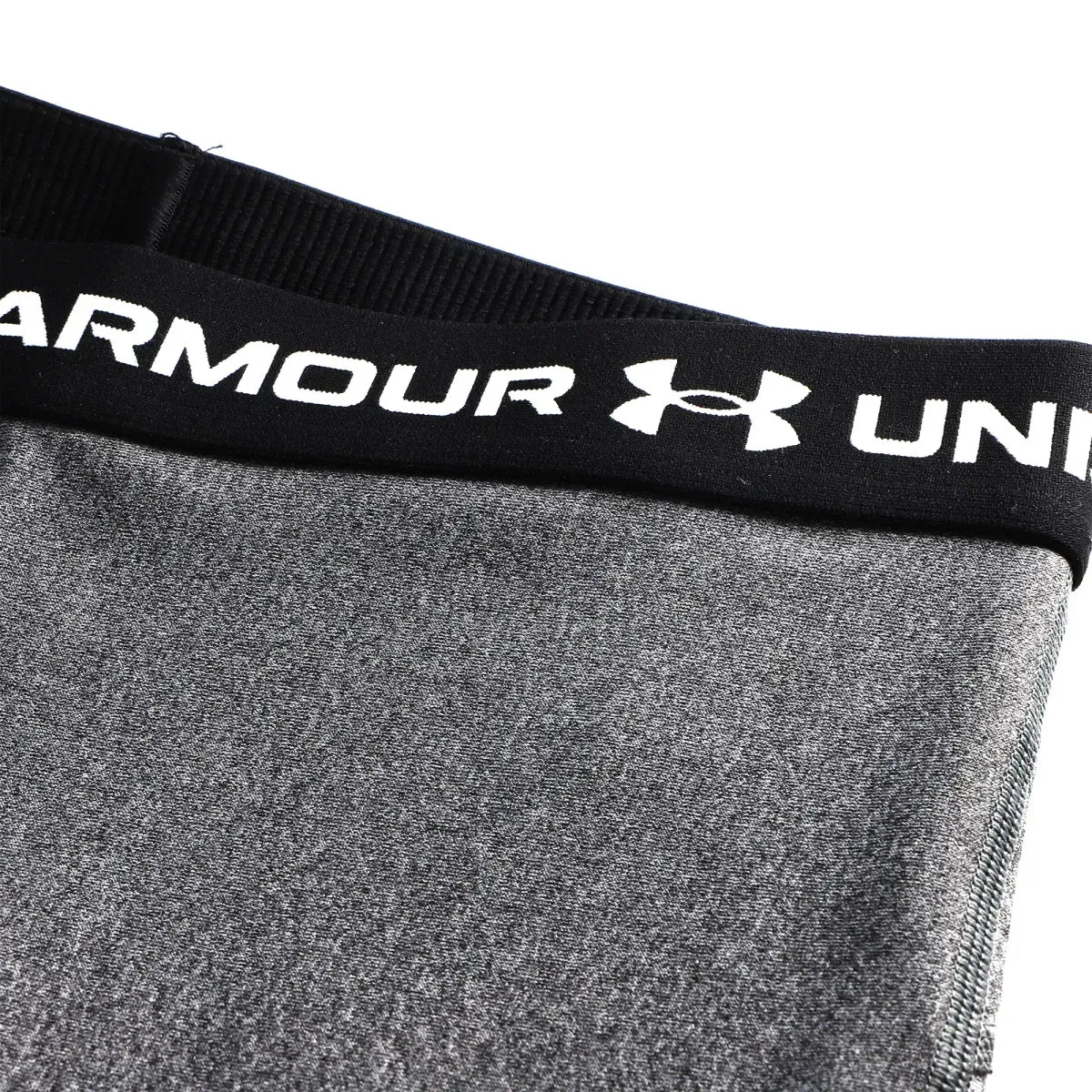 Short Lycra UNDER ARMOUR Gris / Negro 6009998019 | Champ10ns